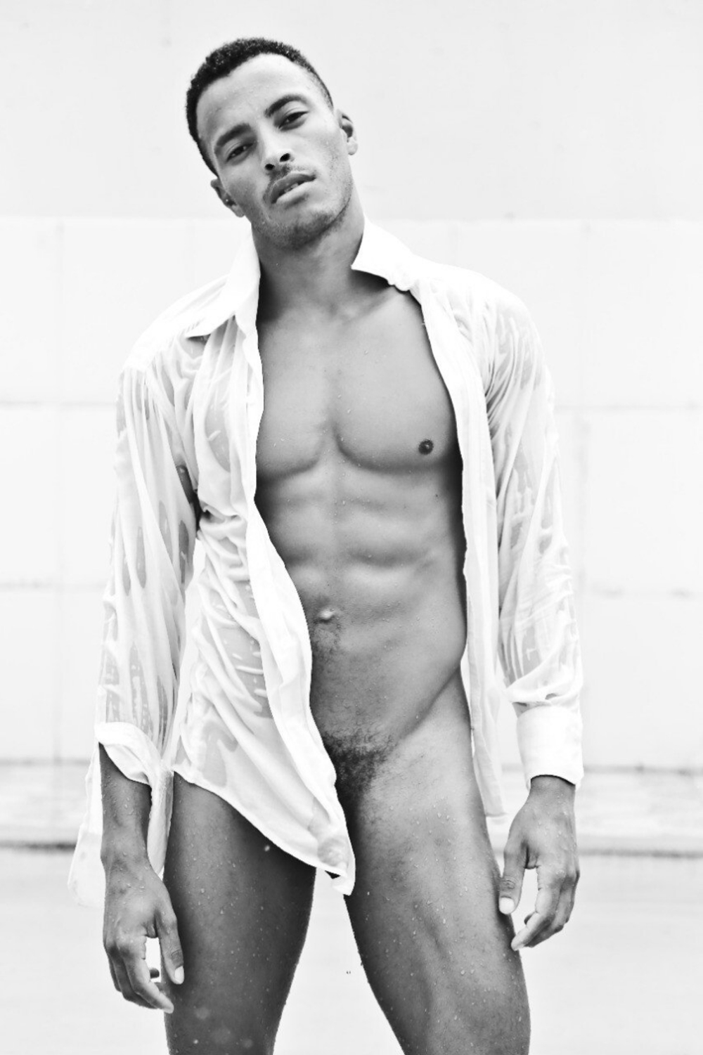 Hung model Deivid Barretto in a white shirt