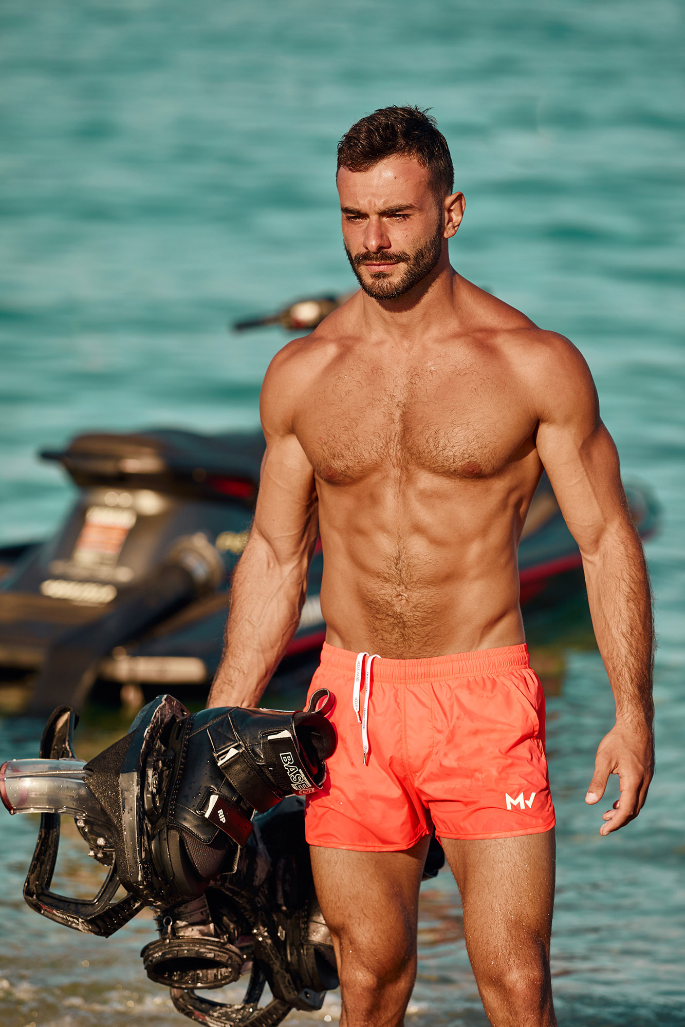 Greek model Denis Mastorakis in Modus Vivendi orange shorts